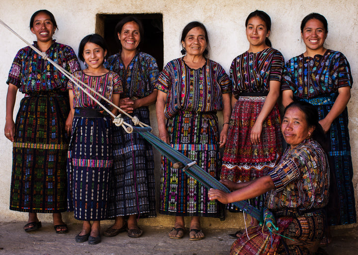 Group of indigenous artisan women wearing traditional clothing
