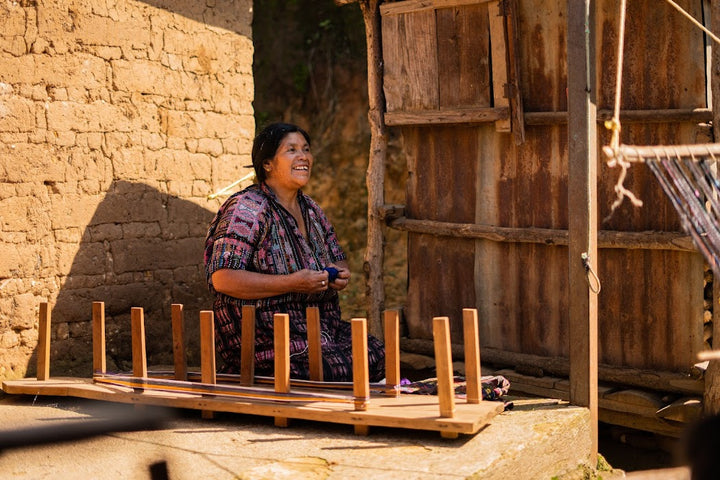 Guatemalan artisan separating the thread before weaving