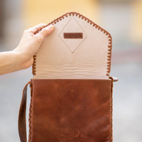brown leather cross body bag