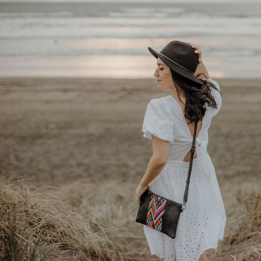 Wearing black leather one of a kind handmade bag