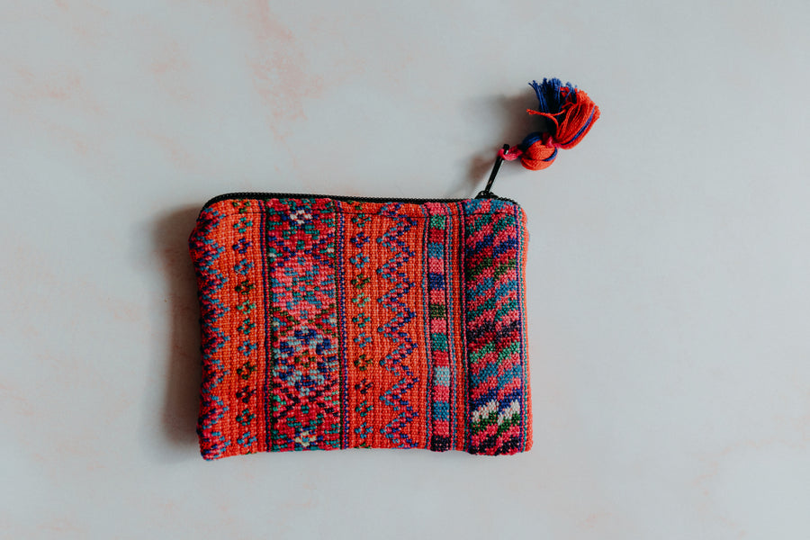 Mini upcycled coin bag, red colour with fun patterns