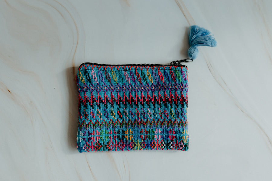 Mini upcycled pouch bag, light blue with fun colourful pattern