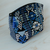 Blue handmade travel pouch bag with tassel detail