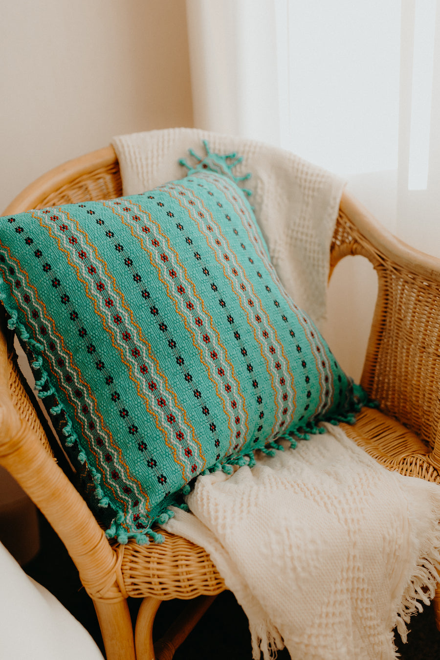 Handmade cushion cover in armchair