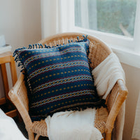 Blue cushion cover in armchair 