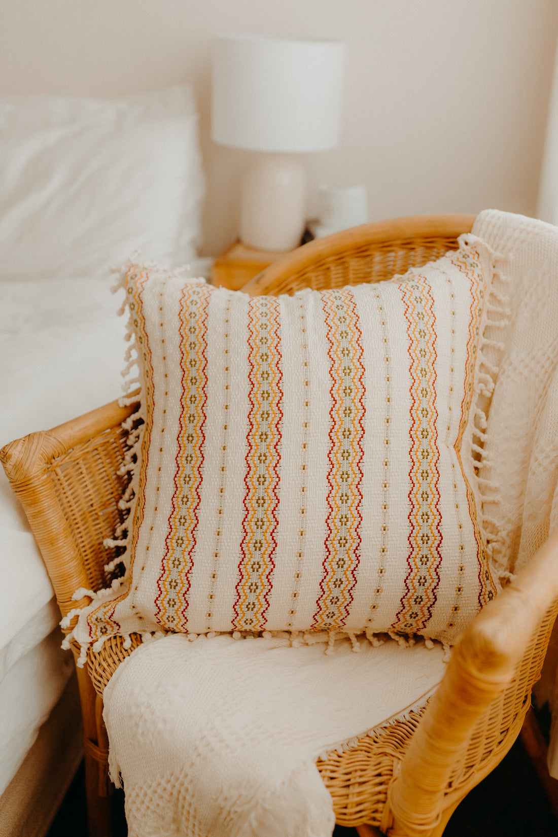 White cushion cover in armchair 