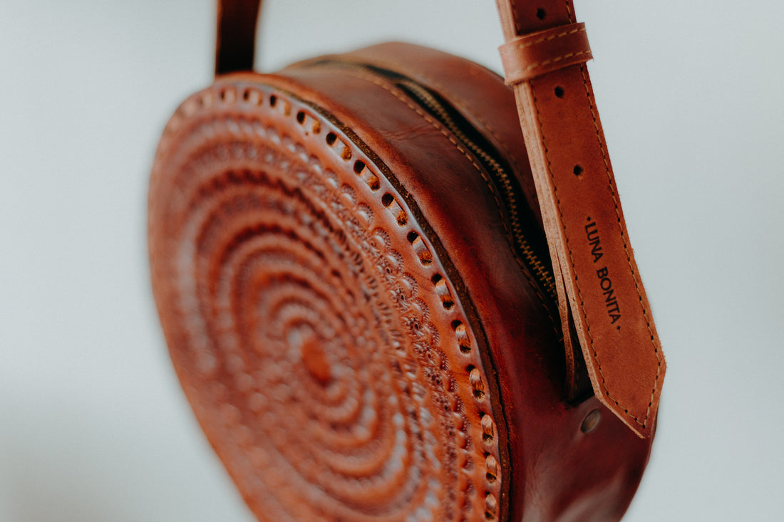 Tooled leather round handmade bag