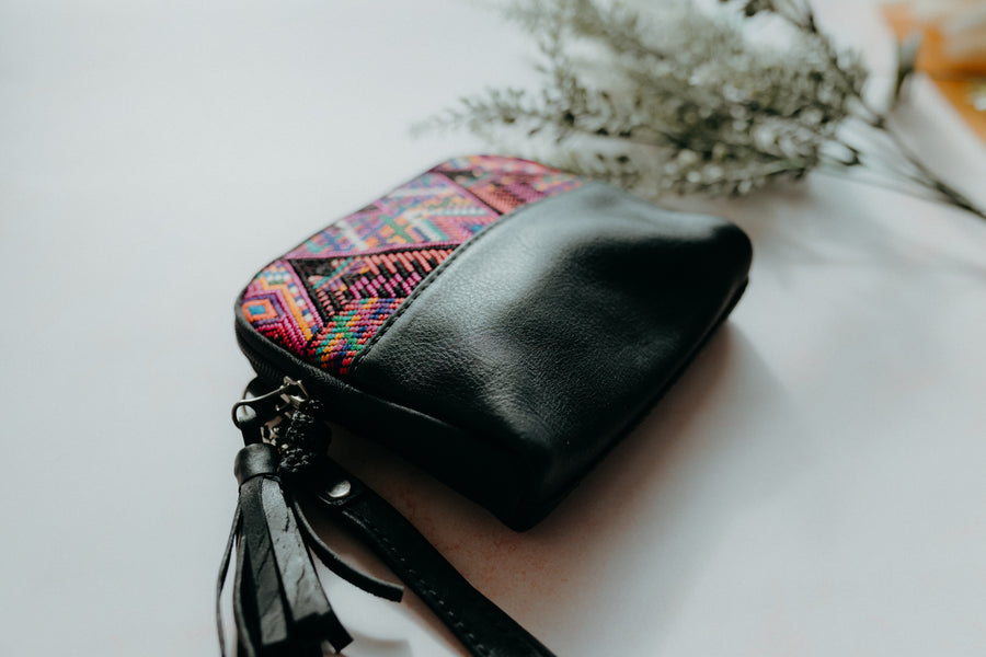 Black leather handbag, with unique upcycled traditional textile panel